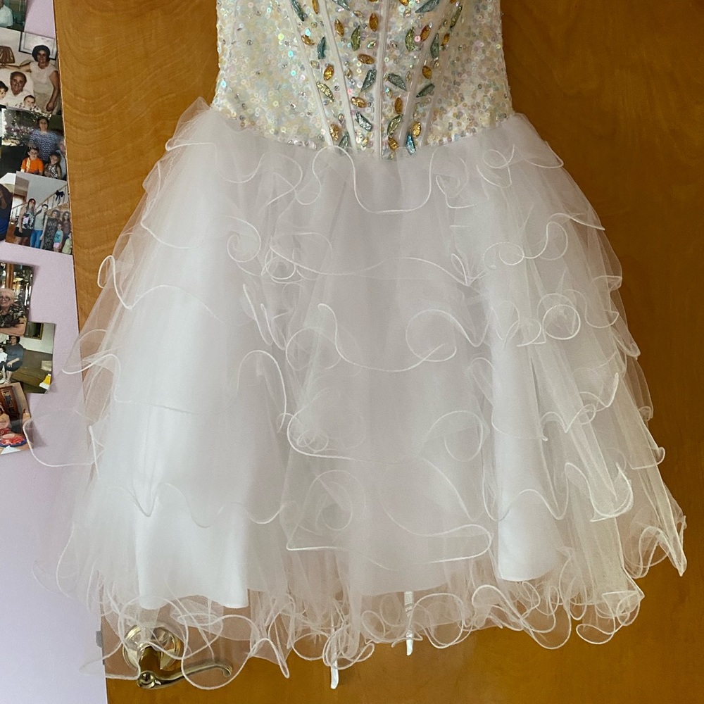 Sequence/ ruffle dress size 2. Perfect condition. Crisscross tie back. Strapless